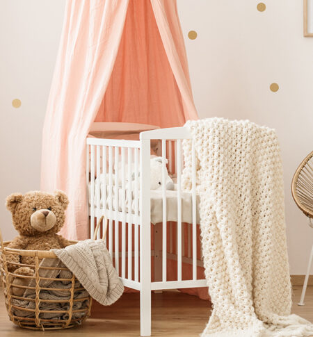 Gold and pink baby’s bedroom